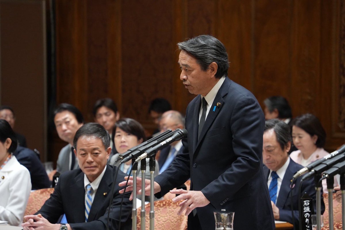 片山財務相、走行距離課税検討否定